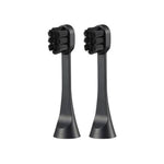 Two black replacement electric toothbrush heads shown upright against a plain white background. | Oral Care | YAMAN International