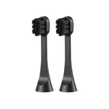 Two black replacement electric toothbrush heads shown upright against a plain white background. | Oral Care | YAMAN International